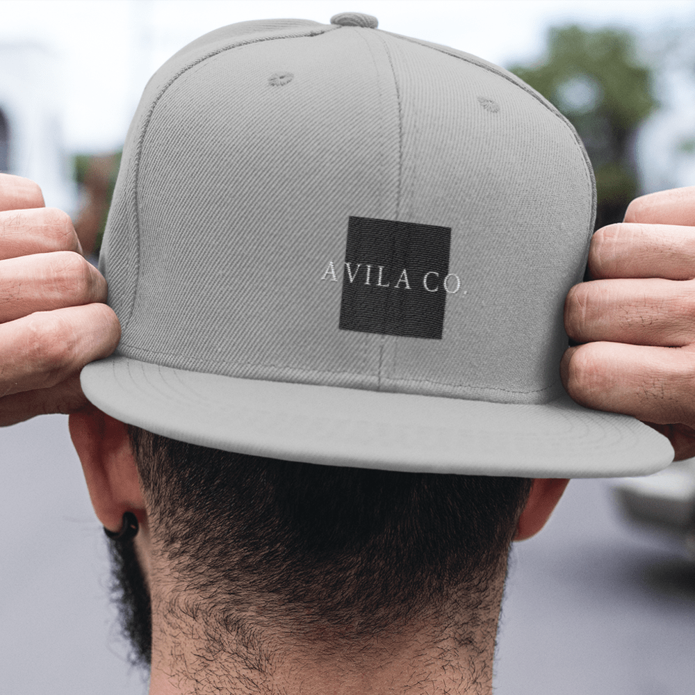 AVILA CO. Square Design by Guillermo Granier Hat, Dark Logo
