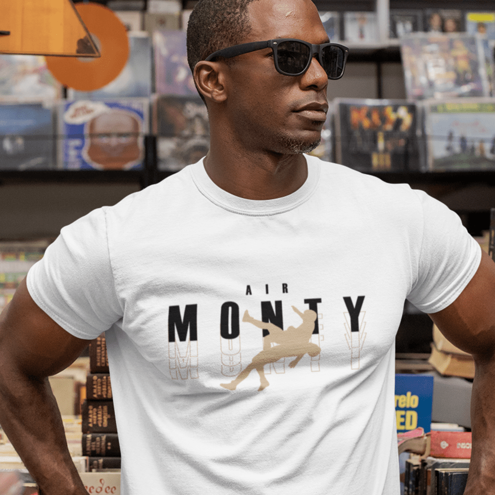 Air Monty" by Michelle Montague T-Shirt, Tan Black Logo