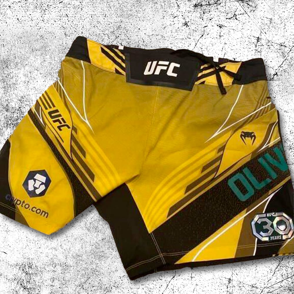 Charles Oliveira Autographed Fight-Worn 30th Anniversary UFC Shorts + Personalized Video.