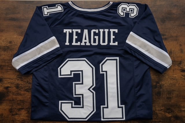 George Teague Autographed Dallas Cowboys Replica Jersey.